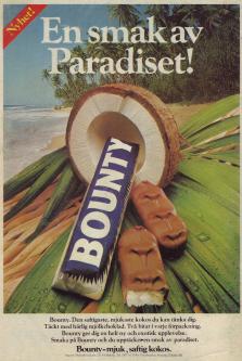 Reklam för godiset Bounty som på bilden ligger i en öppnad kokosnöt på en palmblad på en strand