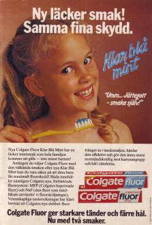 Annons för Colgate tandkräm med en tjej med vita tänder som ler mot kameran