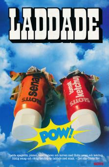 Reklam för senap och ketchup från Slotts där de två tuberna sticker ut från en bild på en himmel med moln och texten "Laddade"