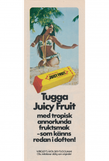 Reklam för tuggummit Juicy Fruit med en tjej i bikini på en sandstrand och palmer i bakgrunden