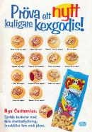 Reklam för kexen Cartoonies där bilden visar upp förpackningen samt ett tjog av de olika kexens utseenden